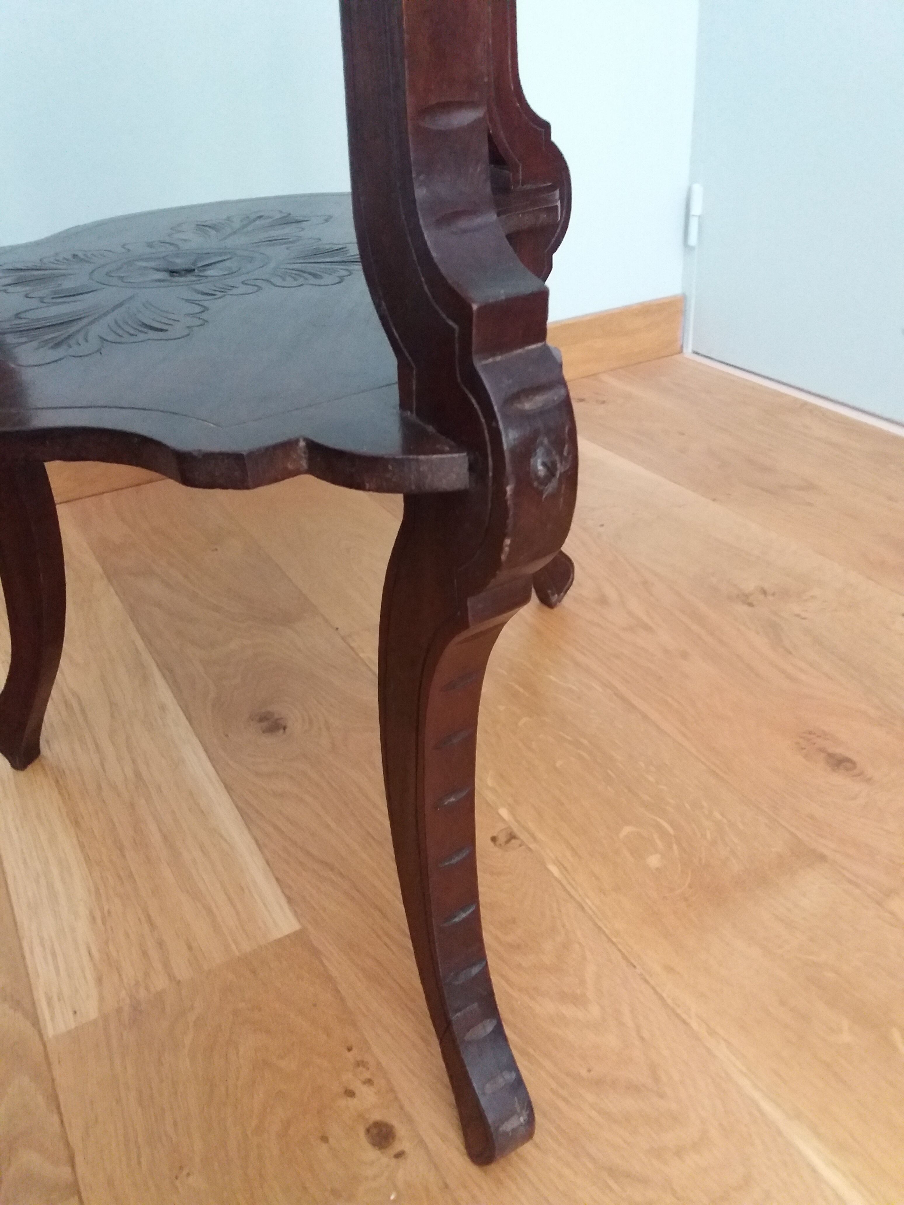 Triplet console harness in carved wood