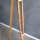 Old floor lamp on surveyor tripod