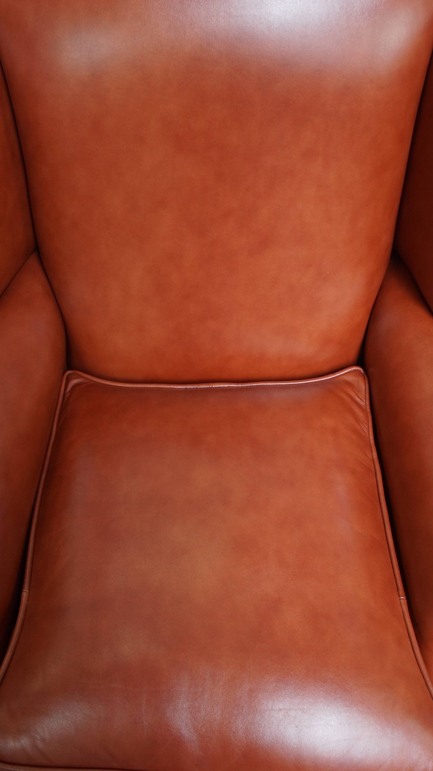 Elegant smooth English cowhide leather Chesterfield wingback armchair
