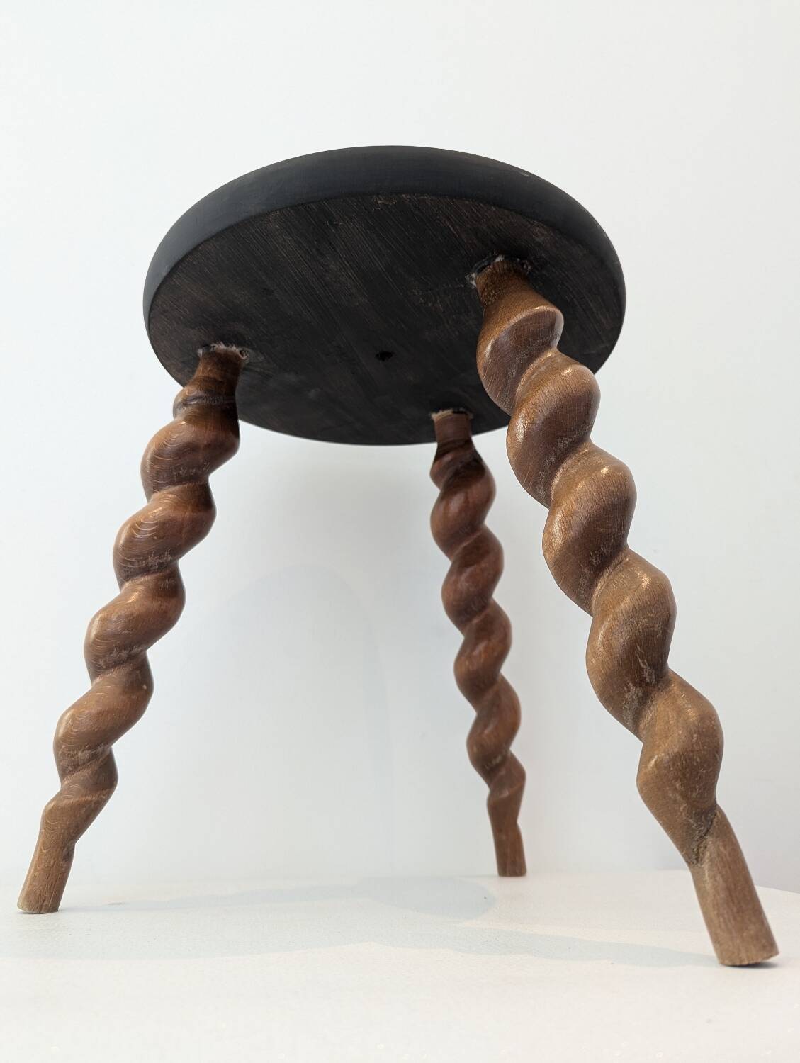 Wooden tripod stool