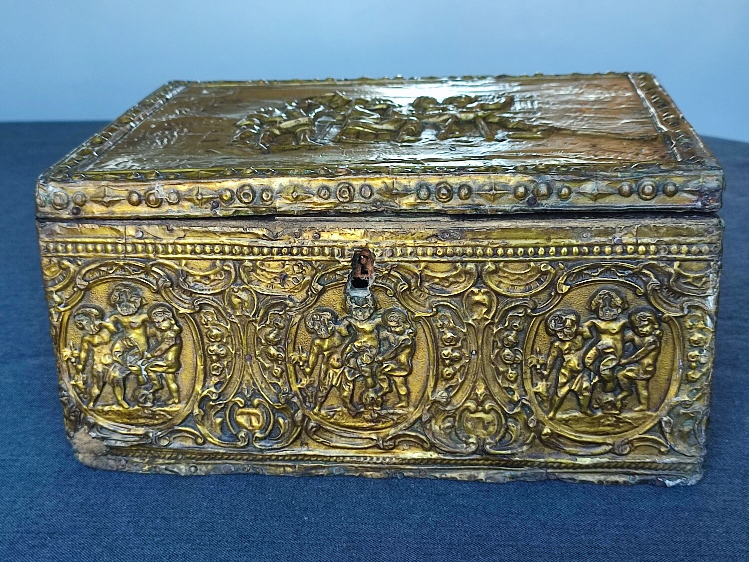 Old wooden box/casket covered with brass