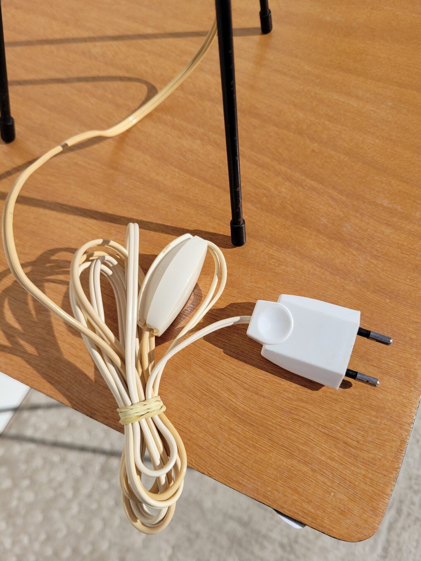 Tripod lamp and rattan from the 1950s.