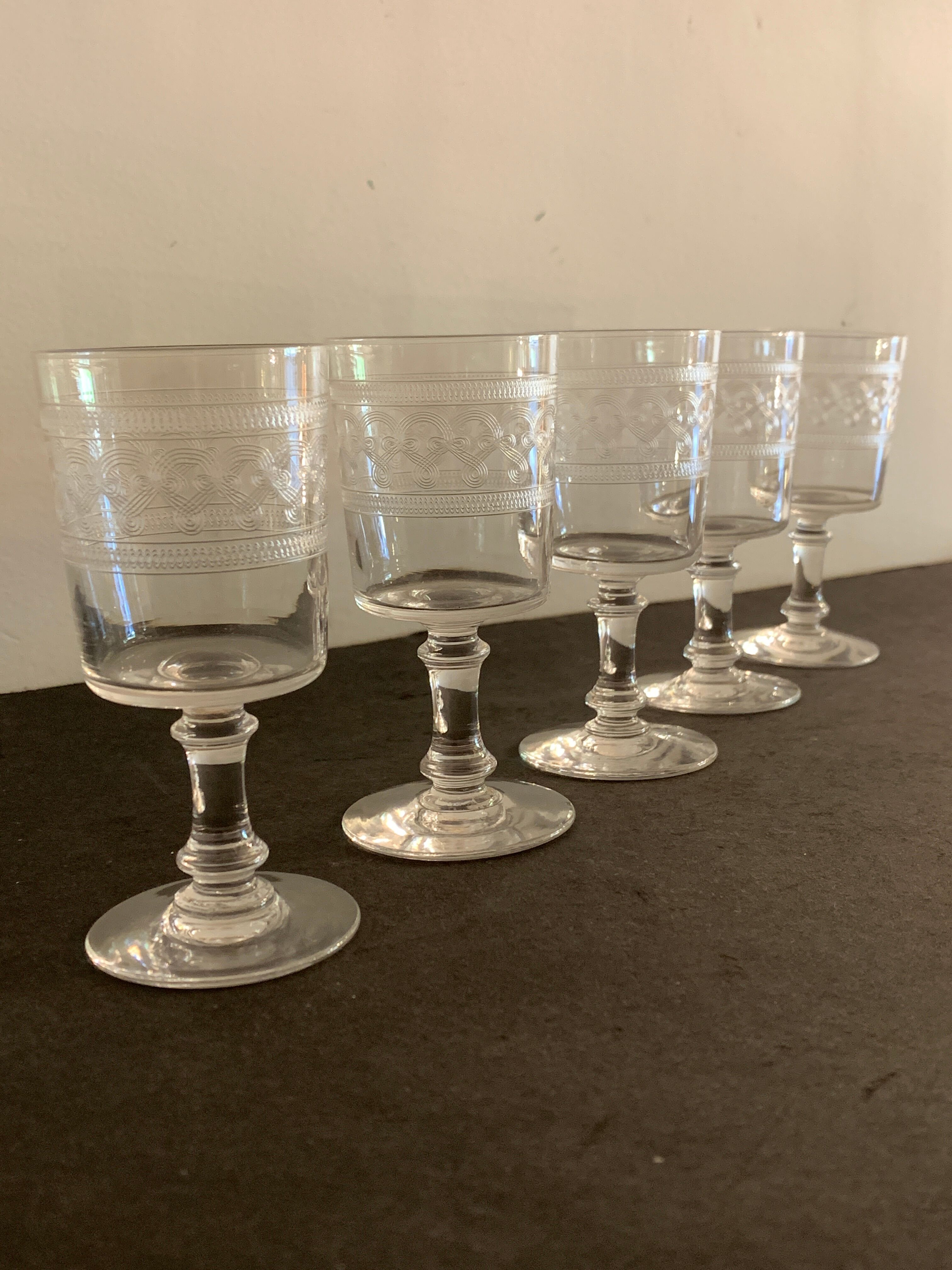 5 engraved and blown crystal digestive glasses