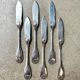 6 Christofle fish knives in silver-plated metal, shell design.