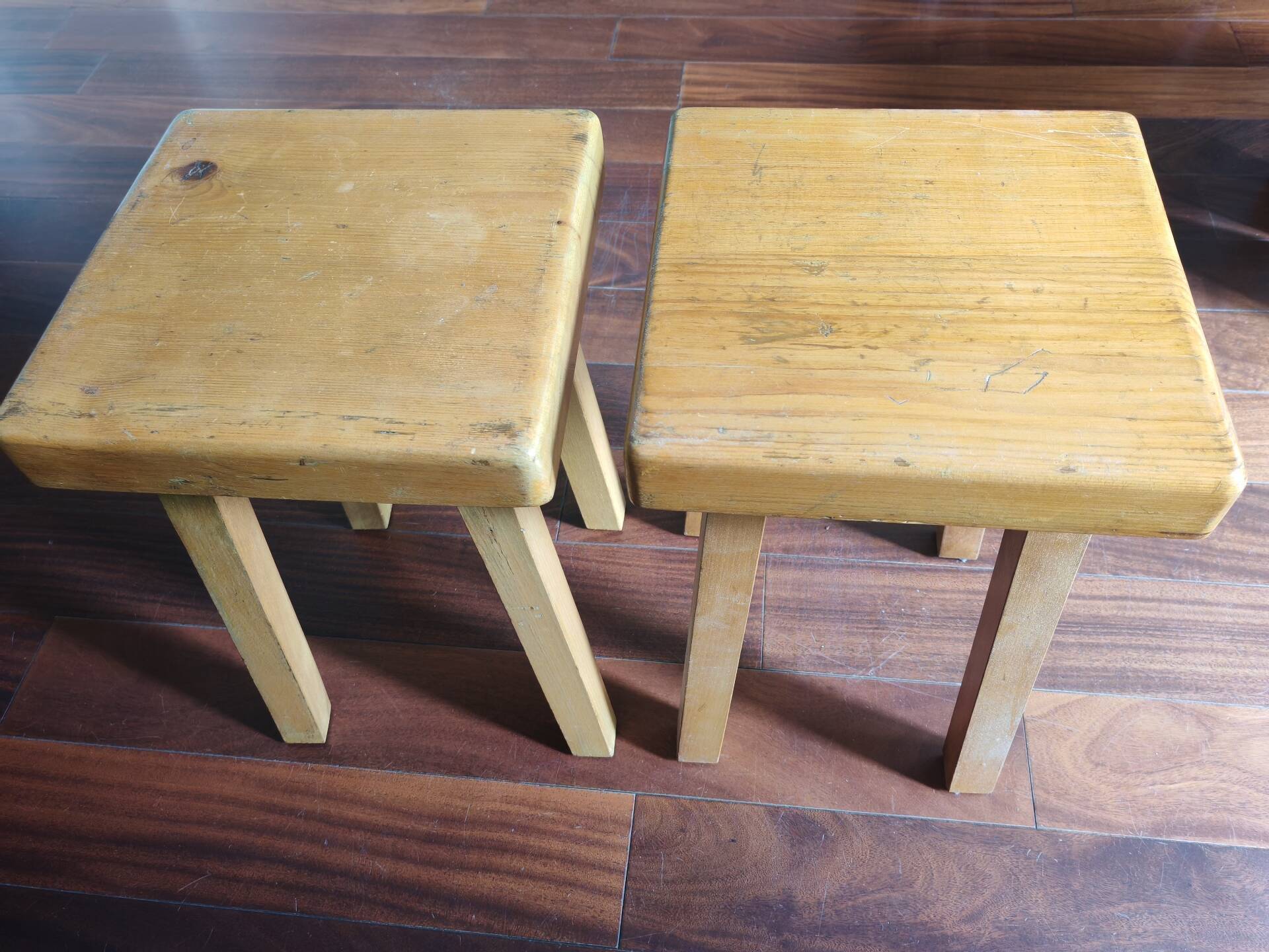 1 set of 2 solid pine stools by Charlotte Perriand, Les Arcs, France.