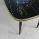 Vintage coffee table with glass top and angled legs