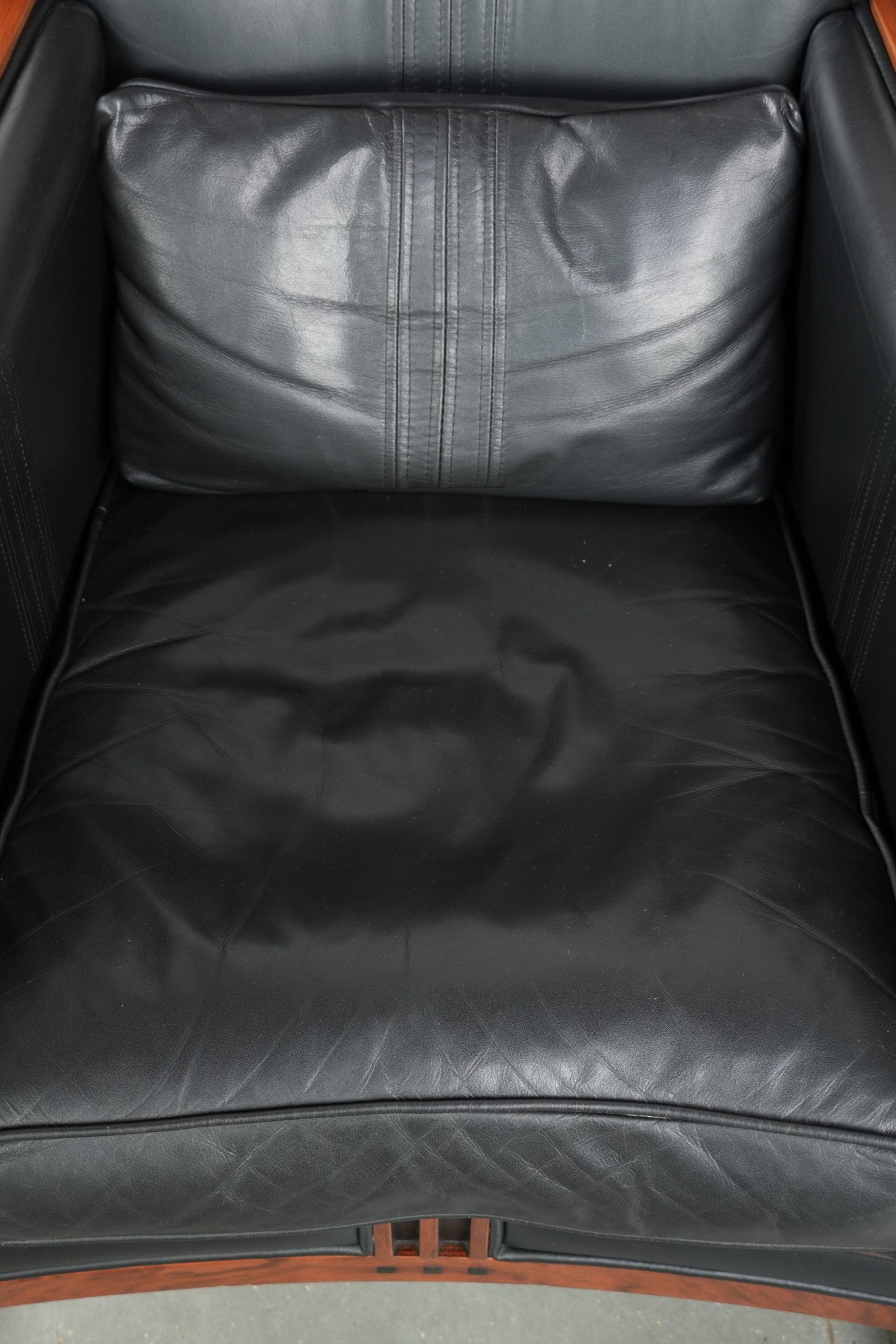 Black leather Art Deco design armchair in good condition