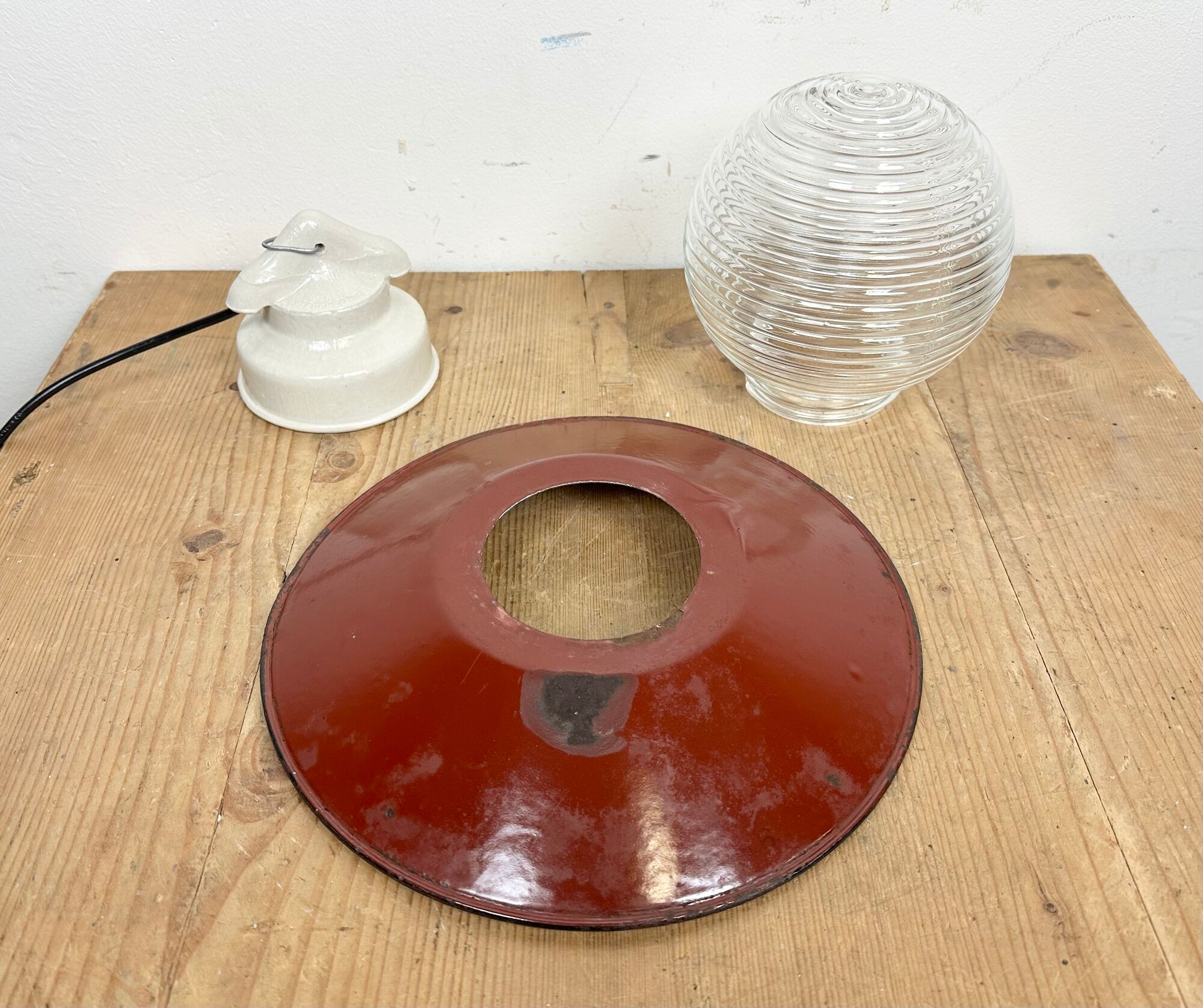 Industrial porcelain red enamel pendant light with ribbed clear glass, 1970s
