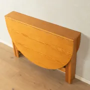 Practical folding table from the 1980s made of light brown pine wood