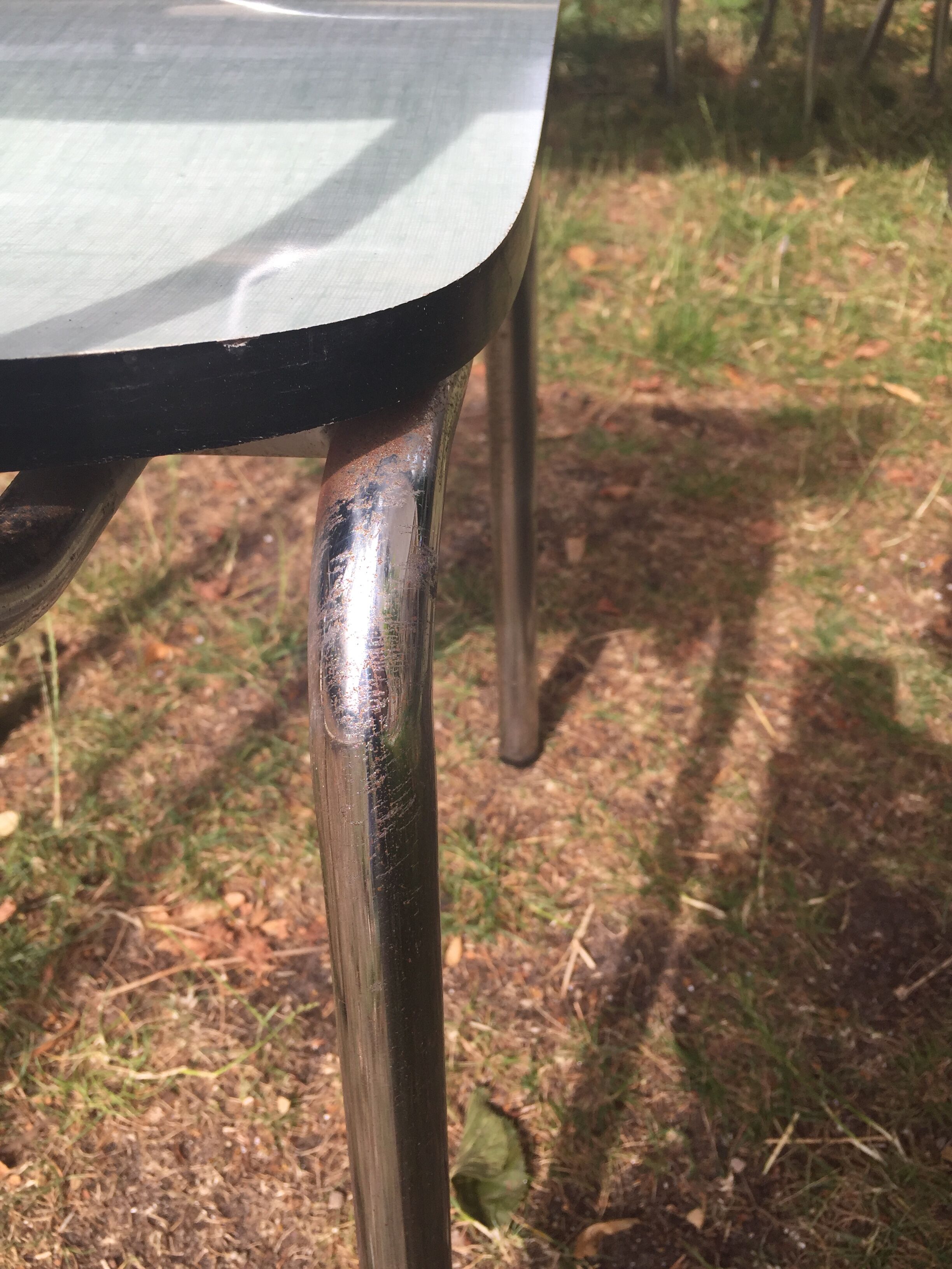 Table and 4 green water formica chairs 60's
