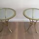 Pair of round gold side tables