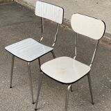 2 beige formica and steel chairs