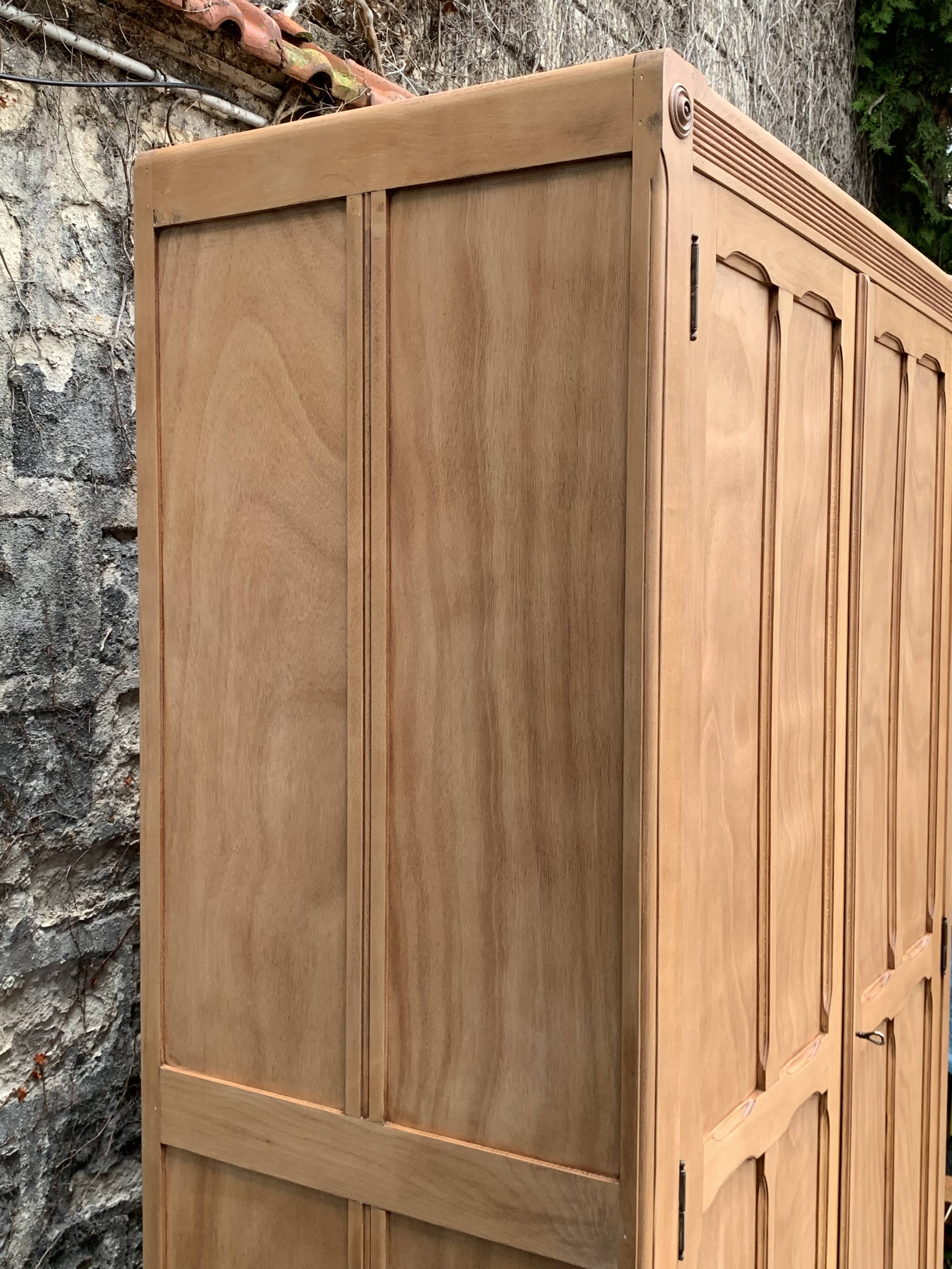 Parisian paneled cabinet in raw wood, 1940