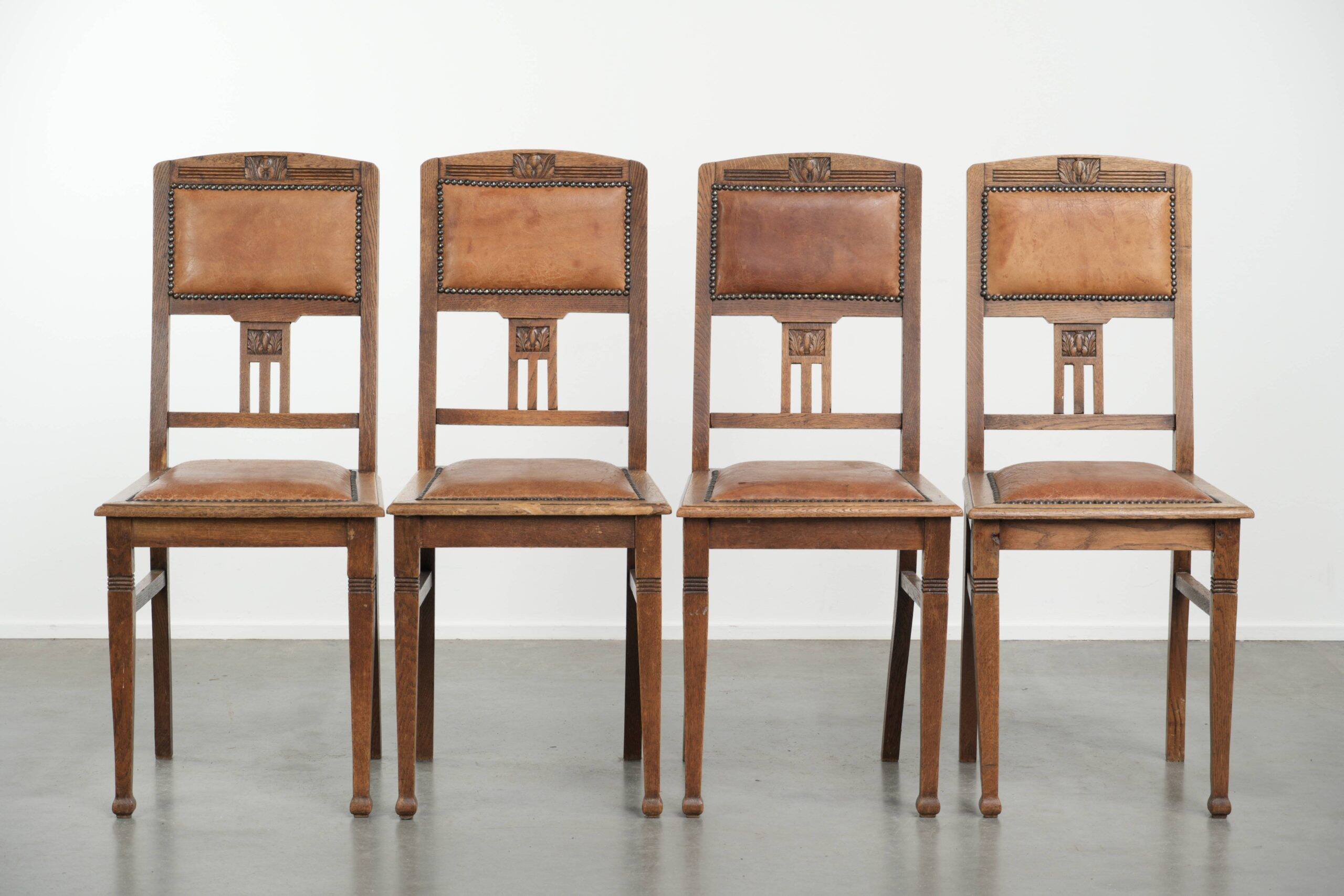 Set of 4 antique oak dining chairs in Art Nouveau style with sheepskin