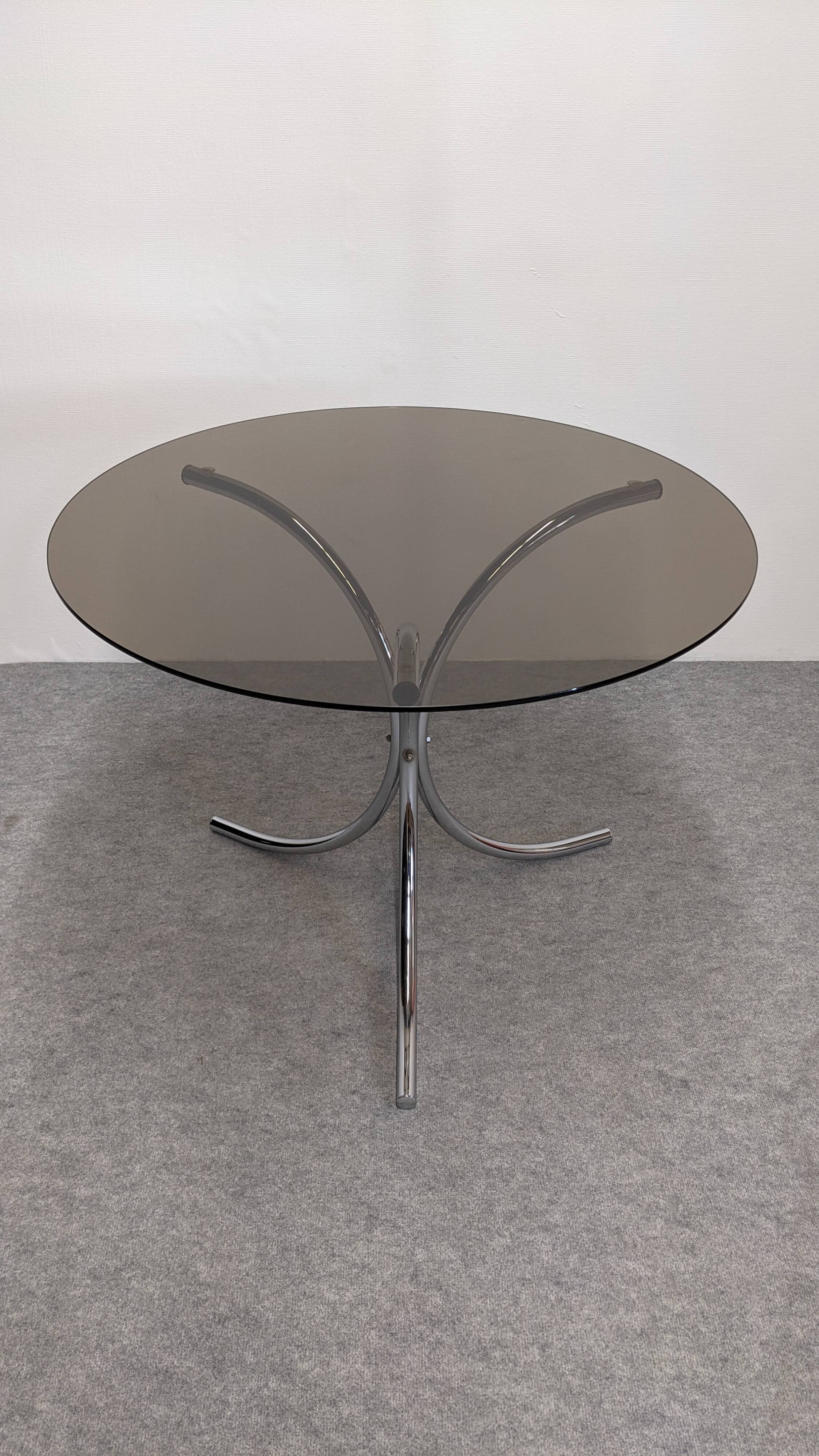 Chrome metal and smoked glass round table, Italy circa 1970.
