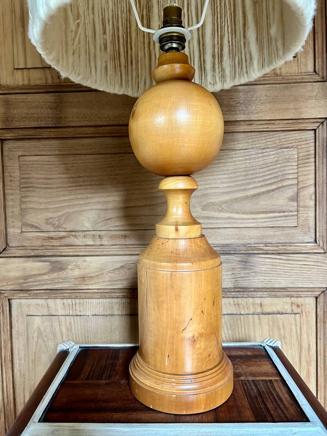 Turned wood base lamp with spun lampshade