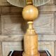 Turned wood base lamp with spun lampshade
