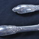 Salad serving set in antique ivory, silver-plated handle.