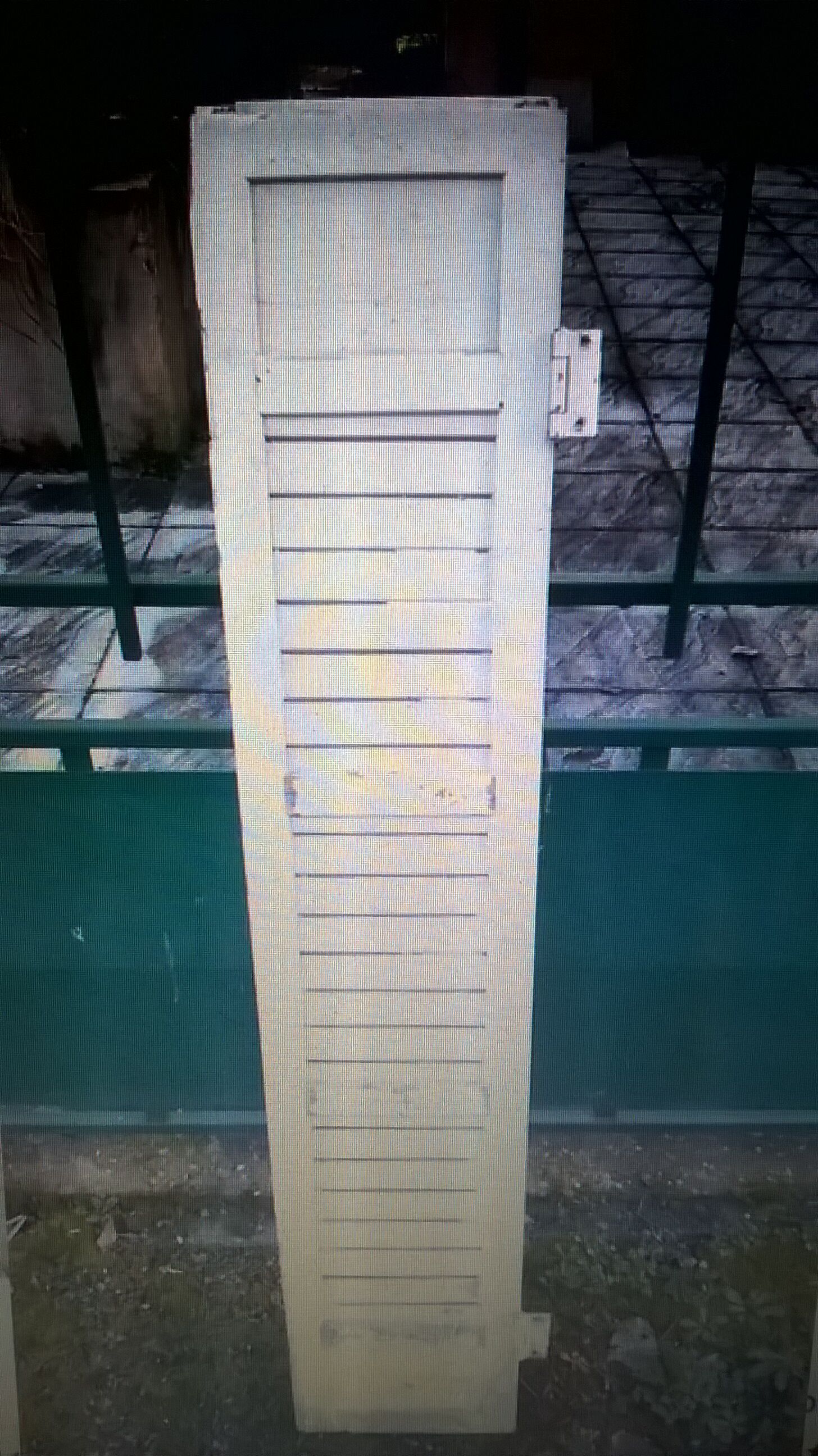 Old wooden louvers shutter