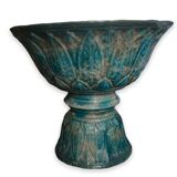 Diabolo shaped cut in blue glazed ceramic