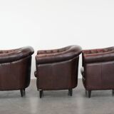Set of three classic English-style Chesterfield cowhide  club armchairs