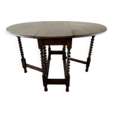 Ancienne table pliante anglaise en bois et pieds tournés 