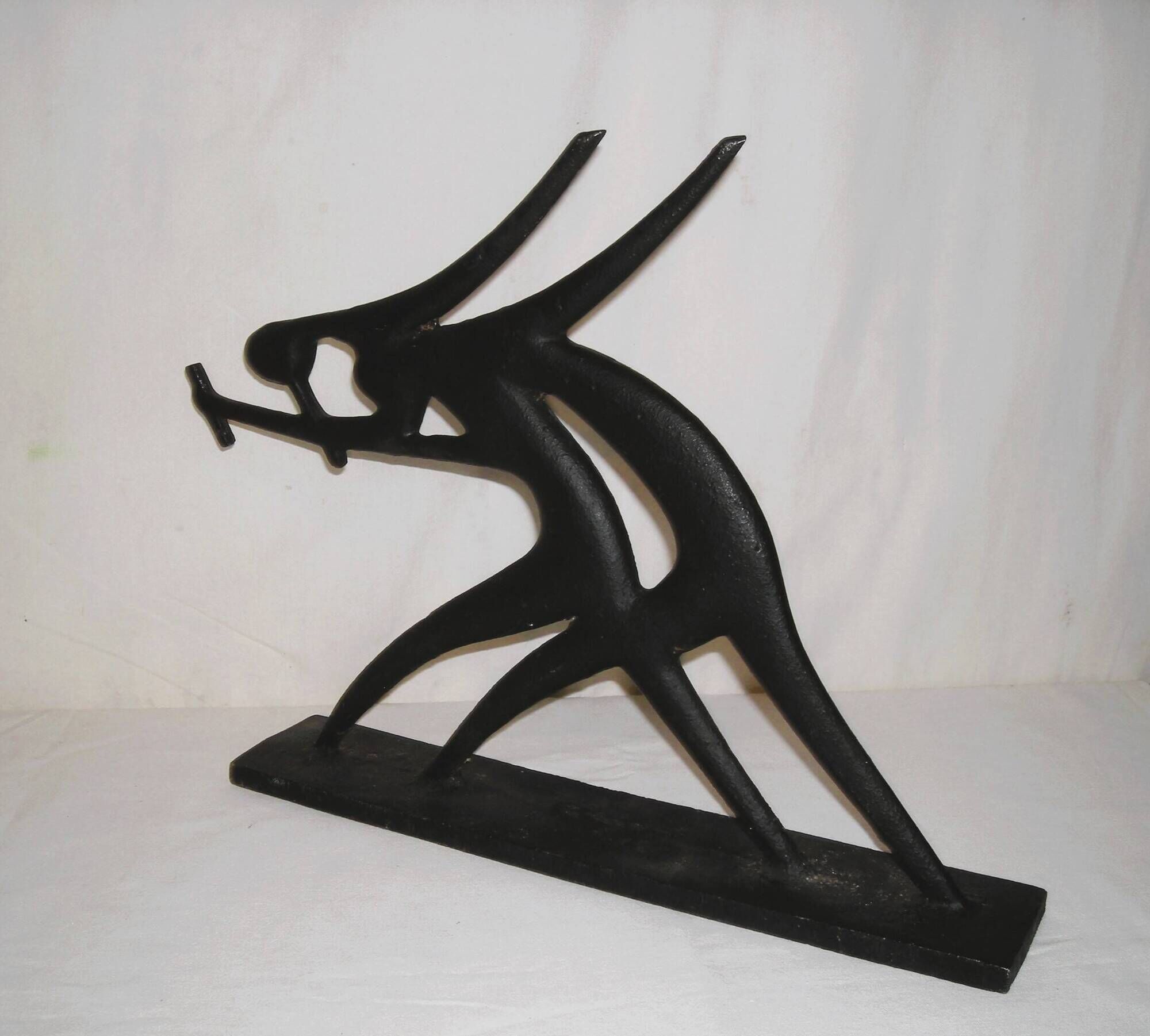 Modernist cast iron statuette from the 1950s.