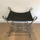 Curule stool in silver steel neoclassical style with swan heads
