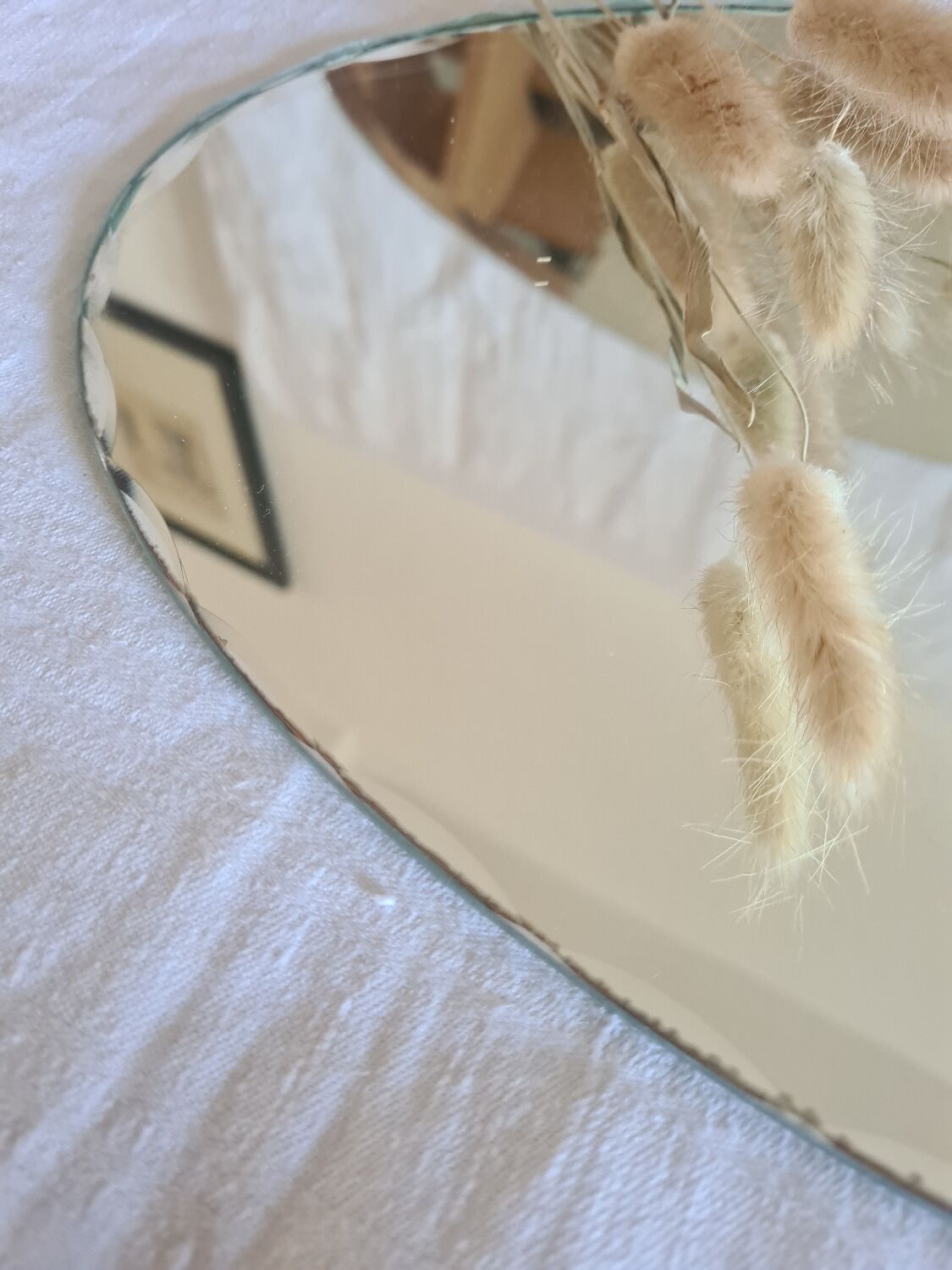 Beveled oval mirror