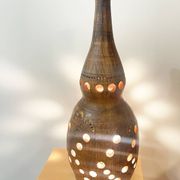 Terracotta lamp with cut-outs, circa 1970.