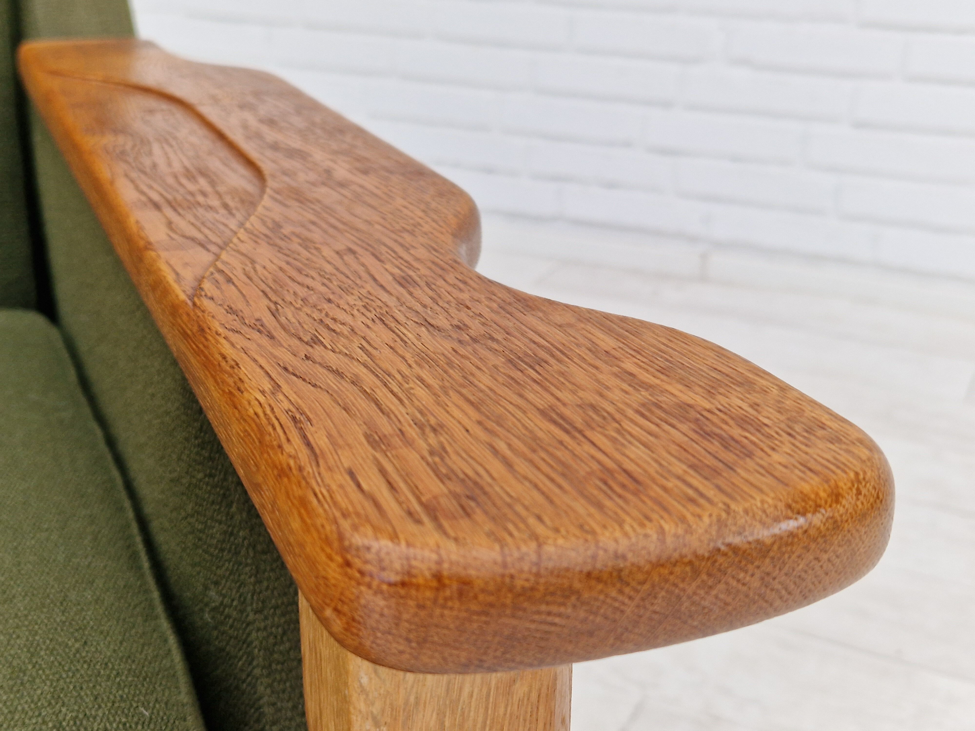 1970s, Danish design, lounge chair in green furniture wool, oak wood