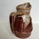 Glazed ceramic pitcher