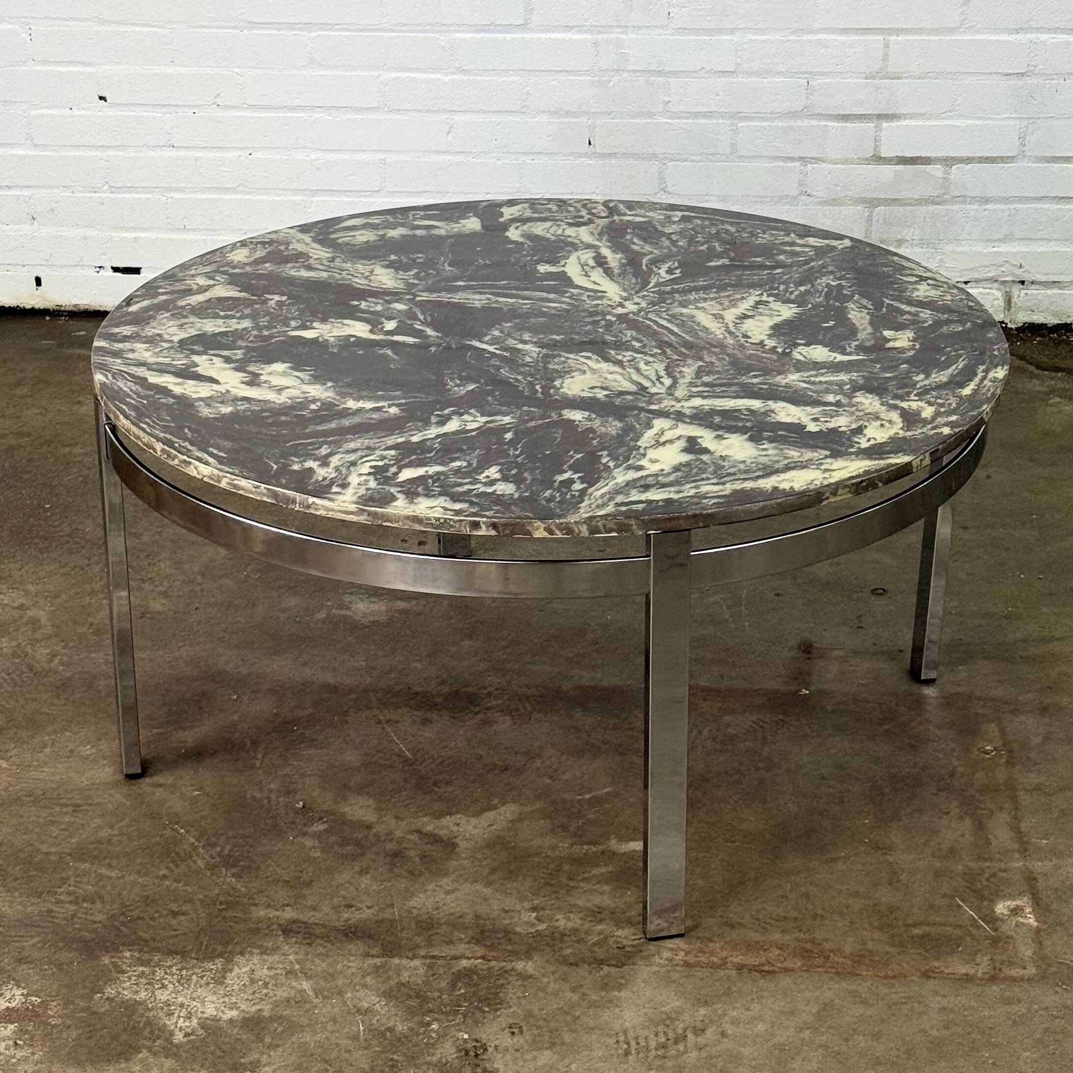 Round vintage coffee table with marble top and chrome base