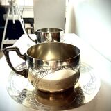 Set of 2 cups with silver-plated saucers, 19th century.