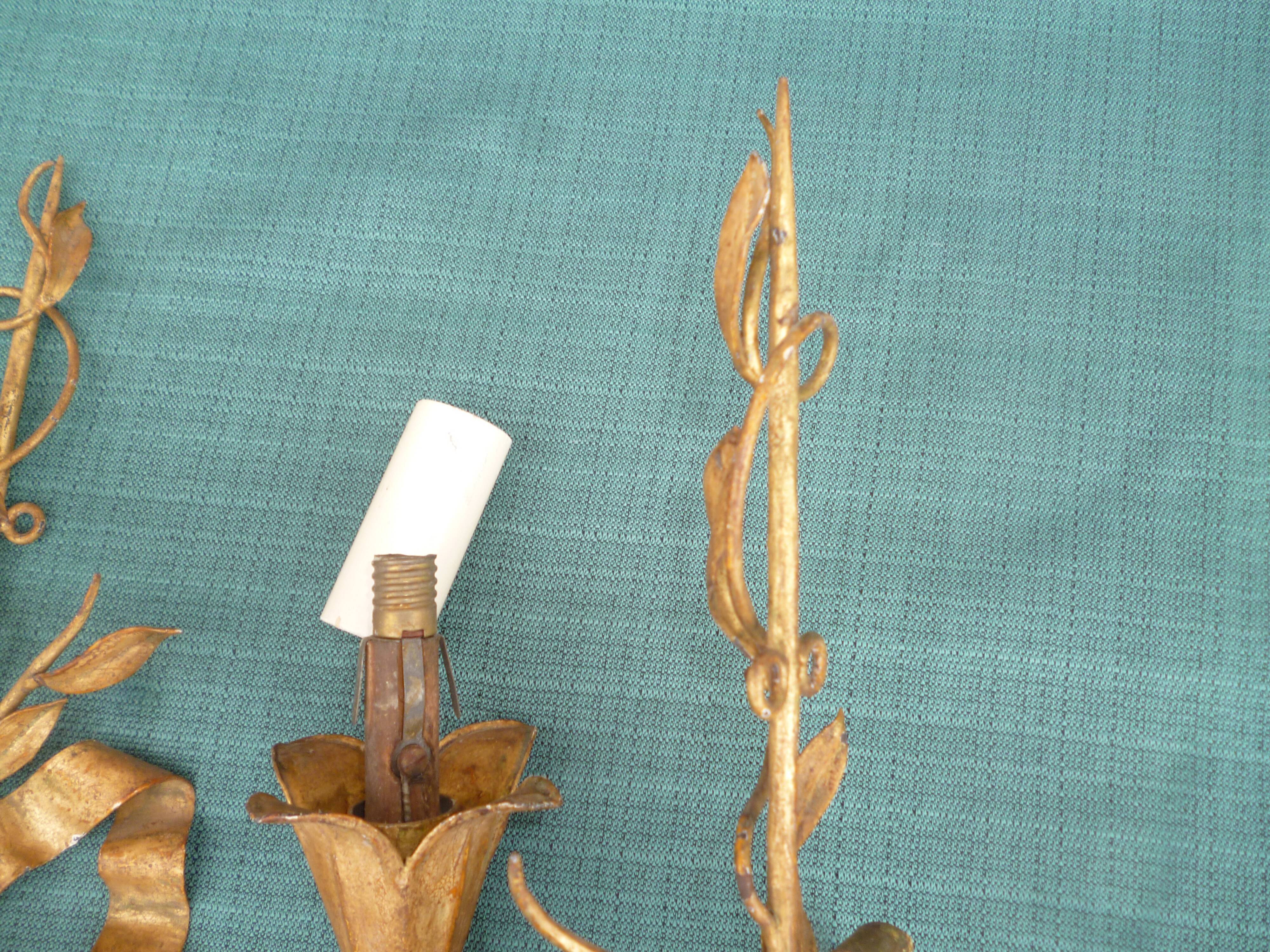Pair of wall lamps gold patinated vintage metal