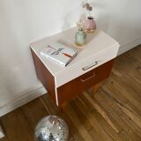 Wooden bedside table and nude