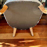 Fully restored beige and graphic armchair.