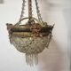 Antique balloon chandelier with pendants, in brass and with mouldings.