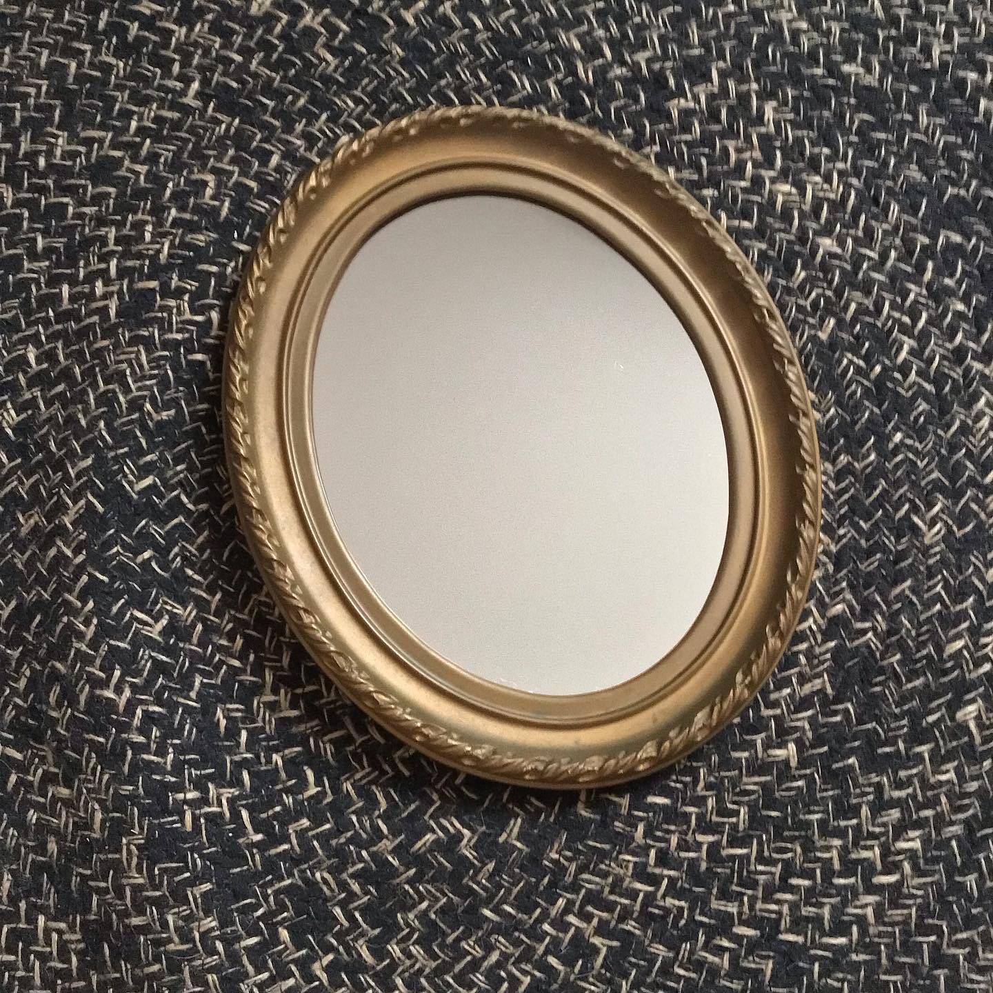 Vintage oval gold mirror