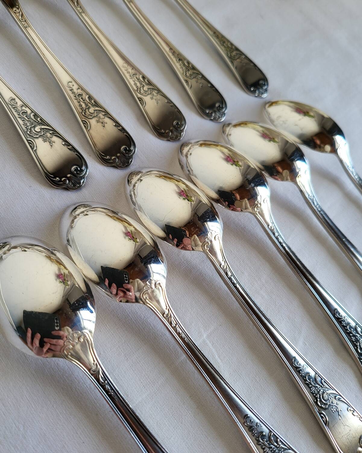 12 small silver-plated metal spoons by Guildart