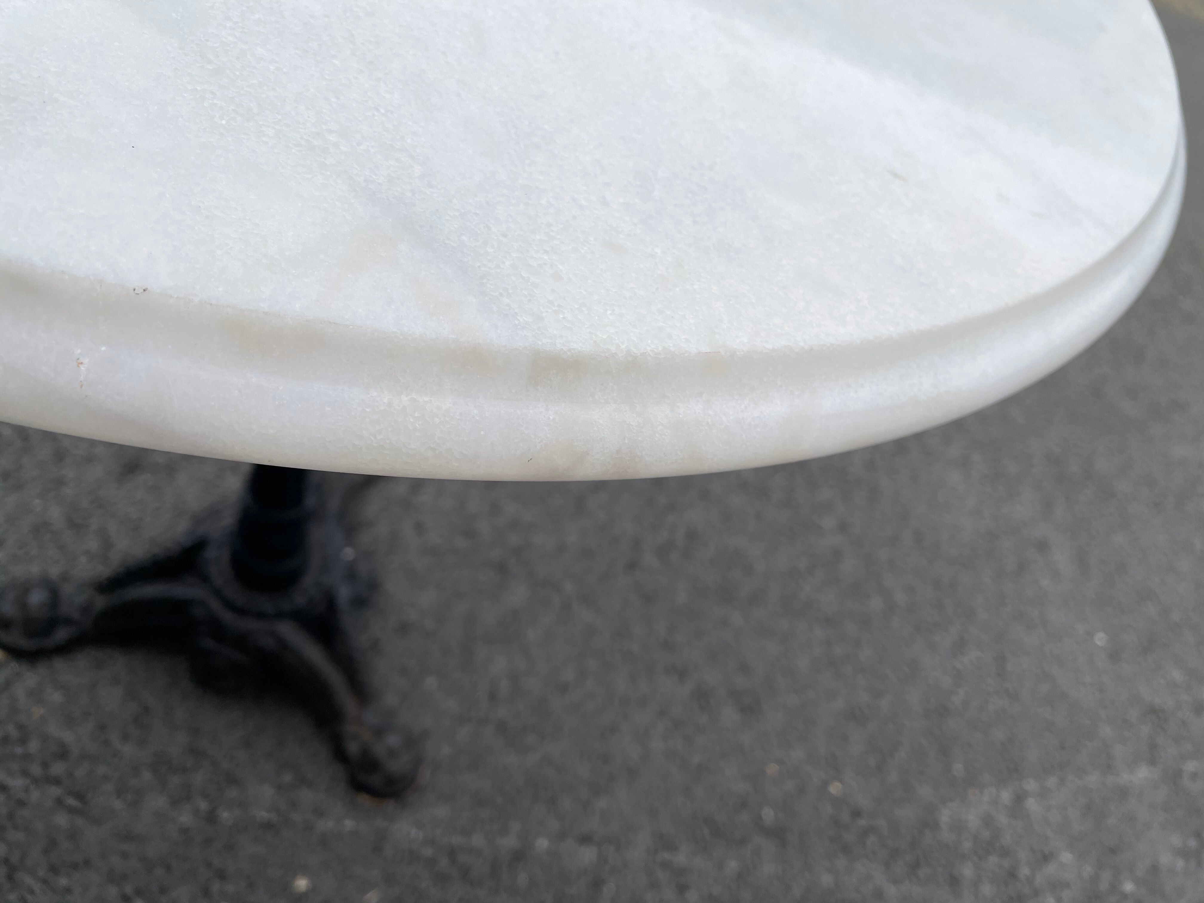 Round bistro table in white marble