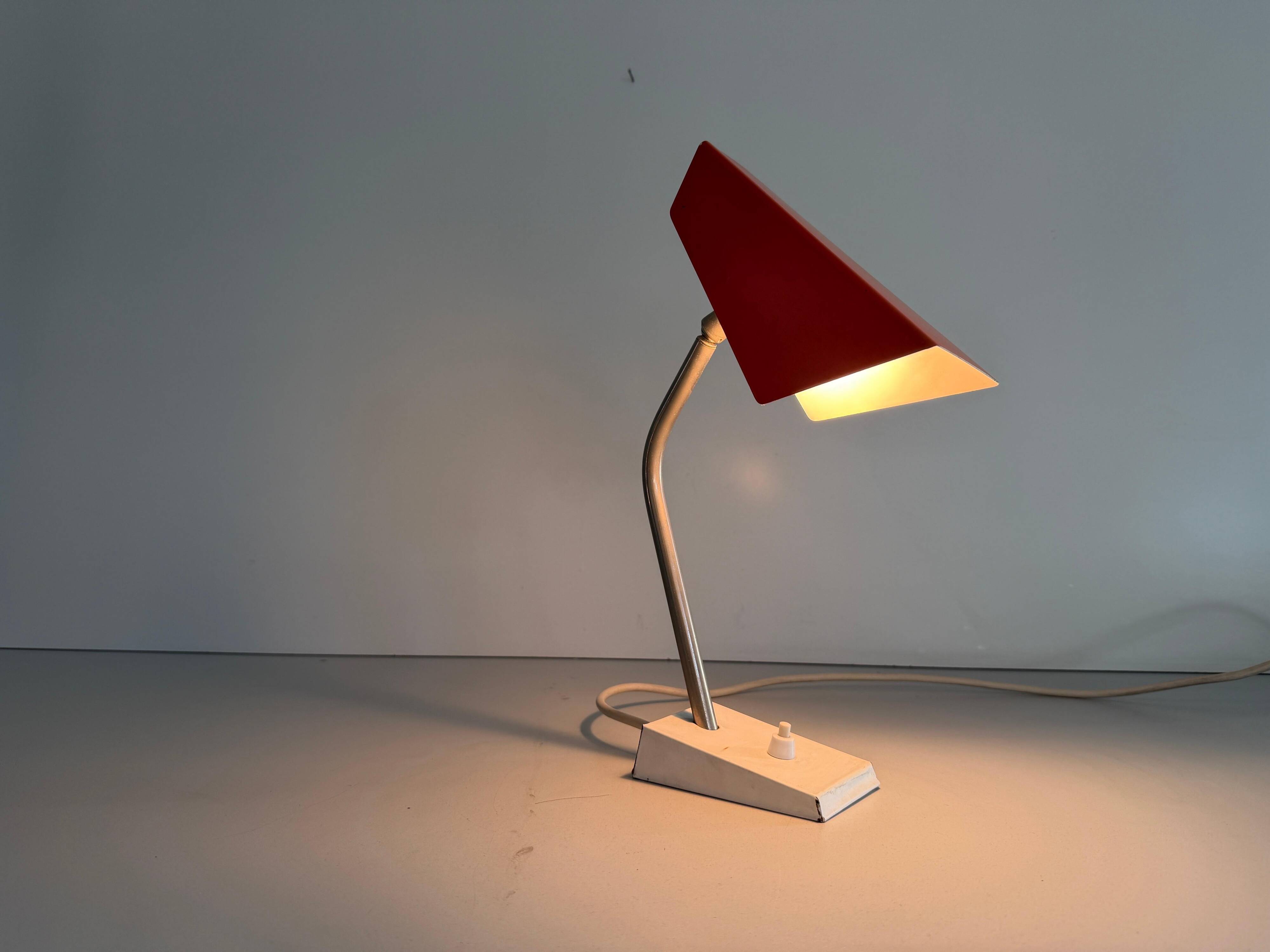 Table lamp with a red metal head, 1960, Germany