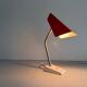 Table lamp with a red metal head, 1960, Germany