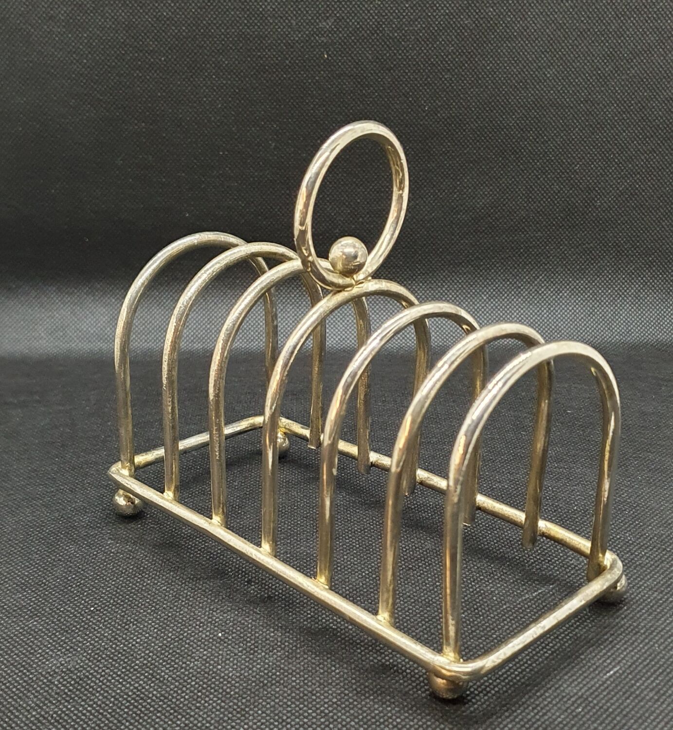 Toast holder in silver metal