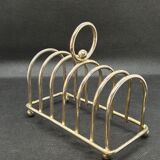 Toast holder in silver metal