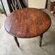 Oval walnut table