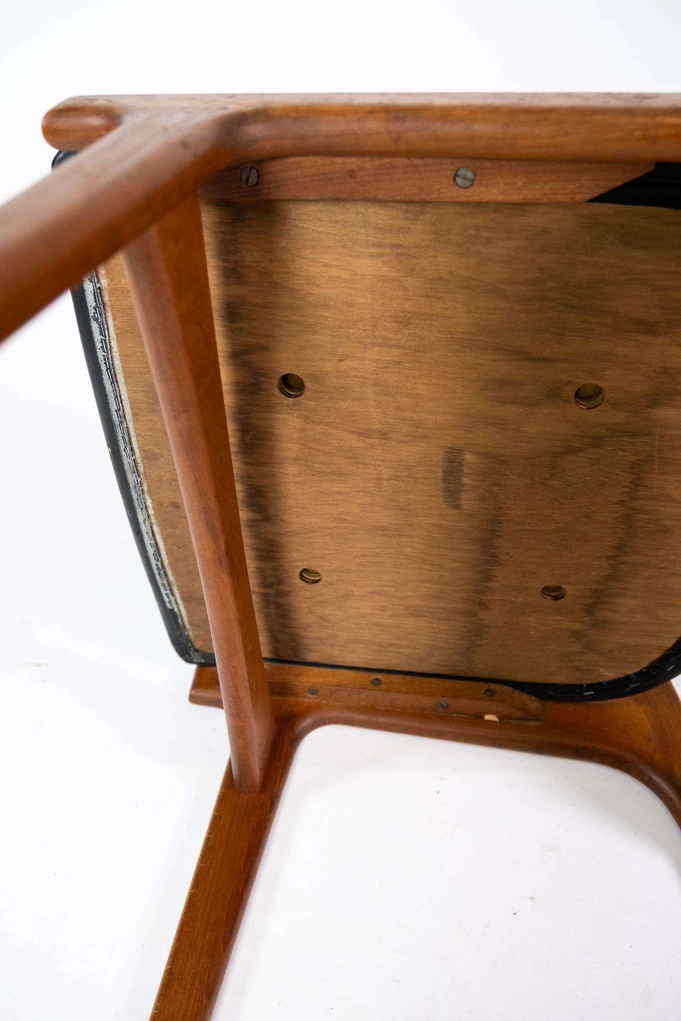 A set of four dining room chairs of teak of danish design, 1960s