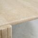 Table basse de forme courbe, travertin, France, circa 1970.