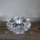 A vintage star flower glass candlestick.