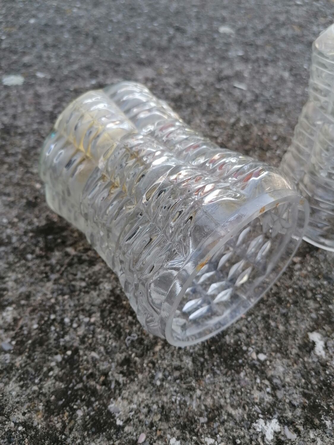 Duo of vintage molded glass globe pendant lights.